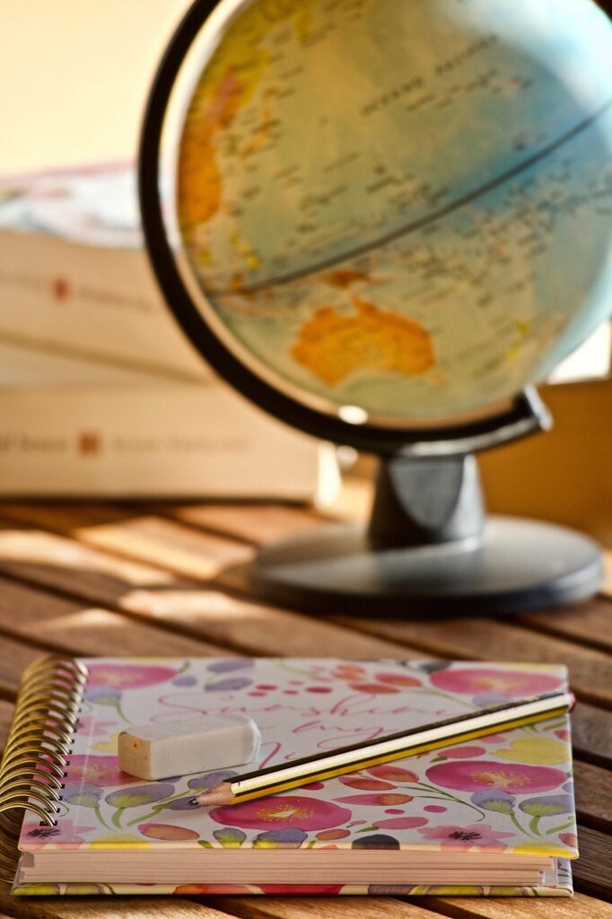 notebook, agenda, pen, pencil, eraser, globe, books, instruction, paper, notes, school, calendar, information